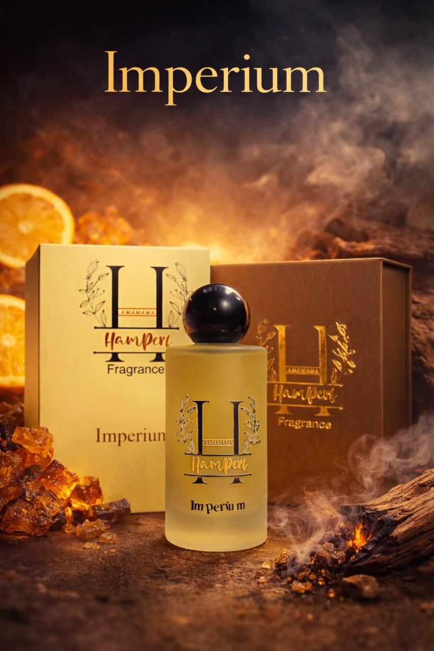 Perfume bottle and packaging with 'Imperium' branding on a warm, smoky background.