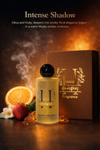 HamPerf Fragrance bottle and packaging with oranges, strawberries, and flowers on a dark background
